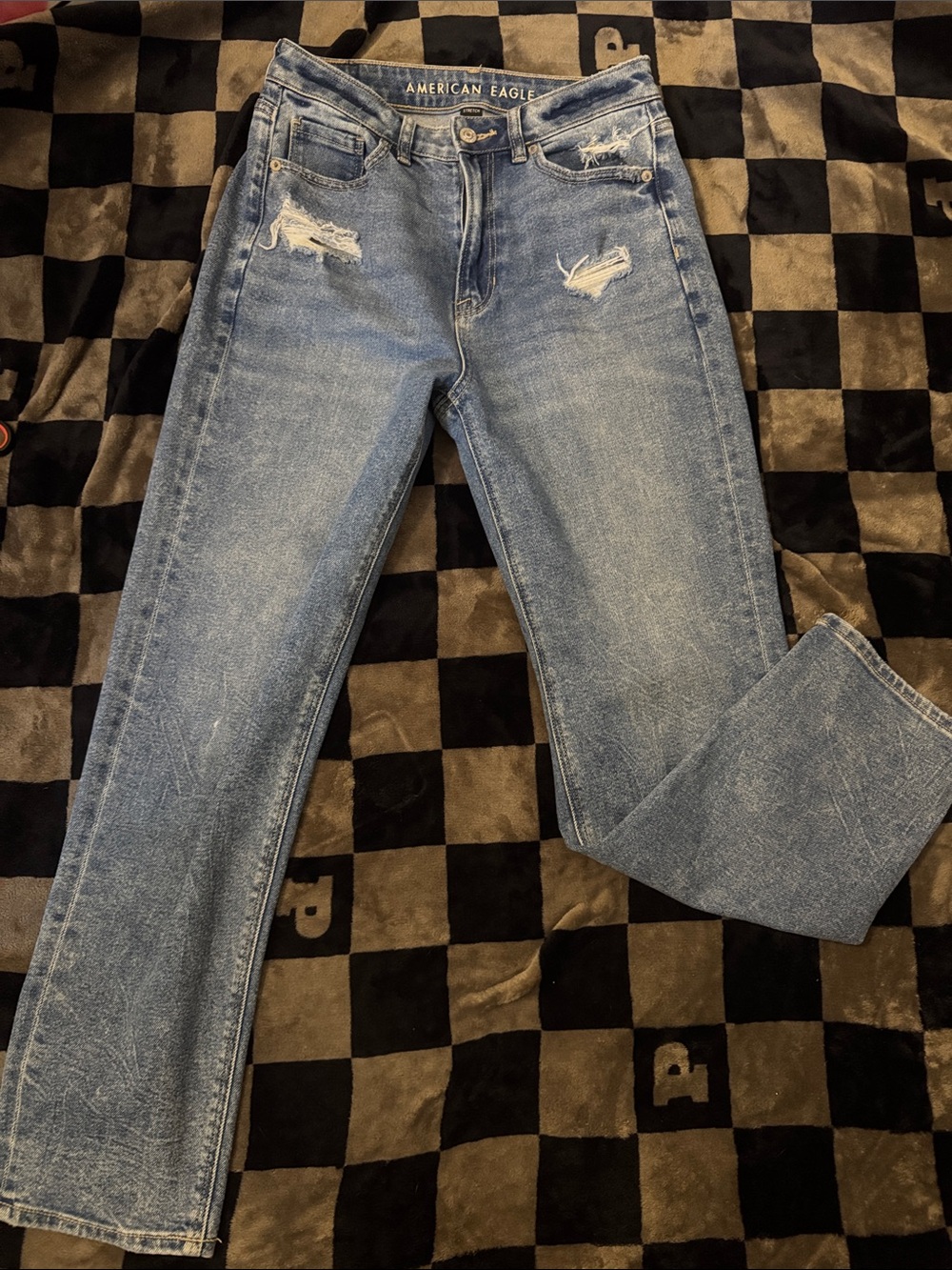 American Eagle Outfitters faded blue straight leg distressed jeans